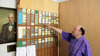 Marlboro administrator Frank Salomon at the famous scheduling board